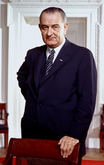 lyndon_b-_johnson2c_photo_portrait2c_leaning_on_chair2c_color_cropped